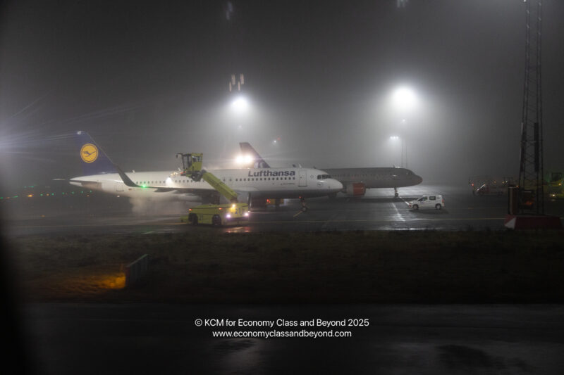 a plane on the runway at night