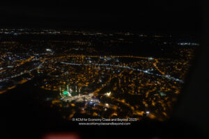 an aerial view of a city at night
