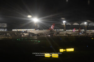 airplanes at an airport at night