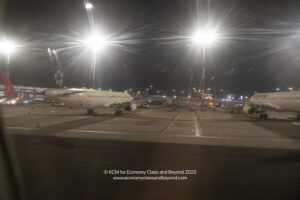 an airplane on a runway at night