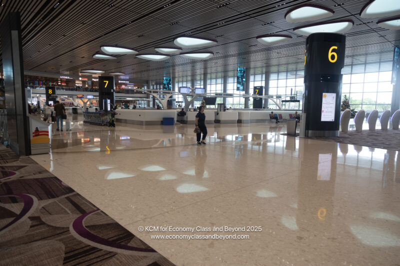 a person walking in a large hall