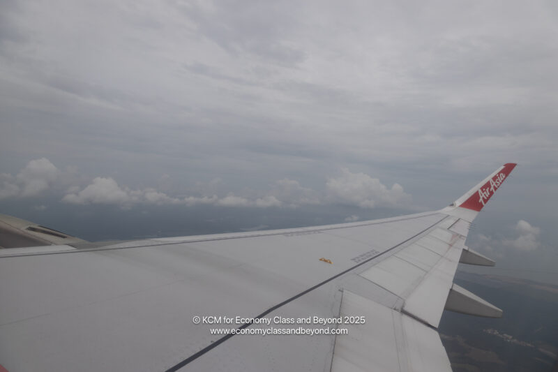 an airplane wing in the sky