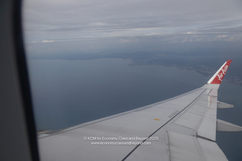 an airplane wing and water