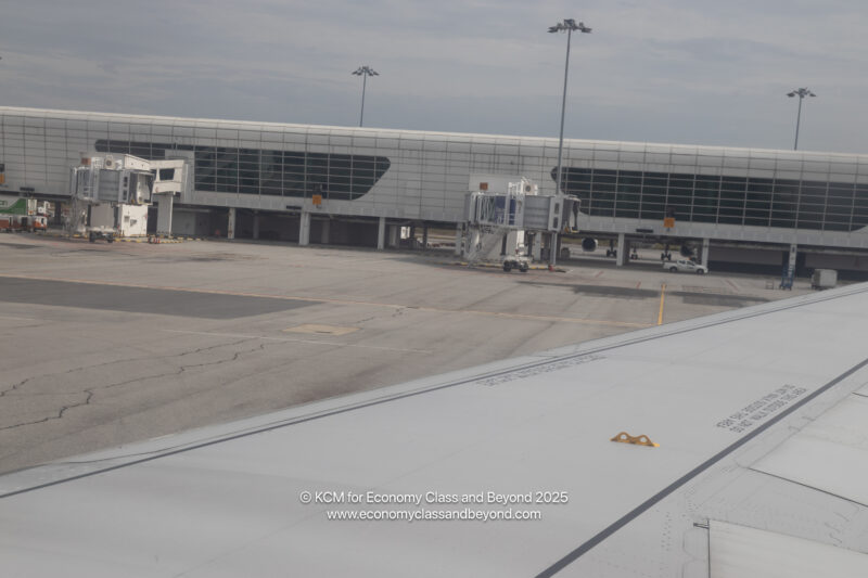 an airplane wing at an airport