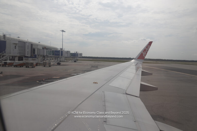 an airplane wing at an airport