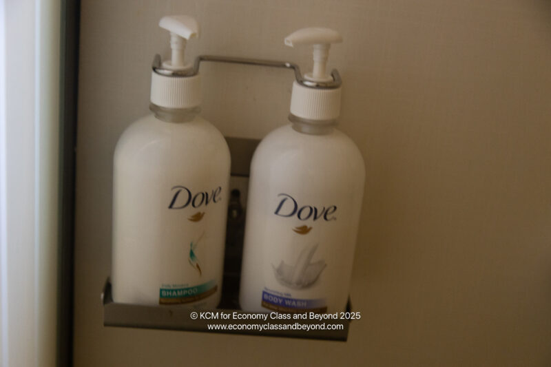 a couple of white bottles of soap