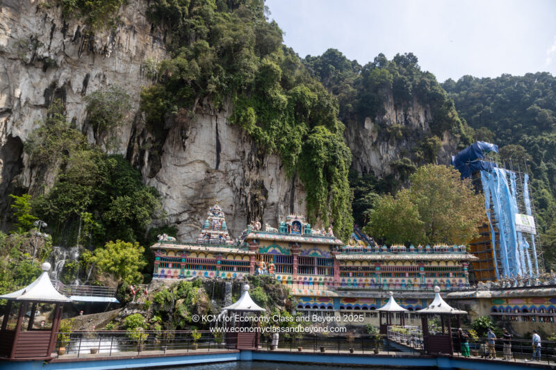 Batu Caves with a cliff in the background