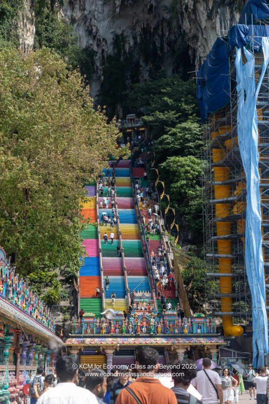 a group of people on colorful stairs