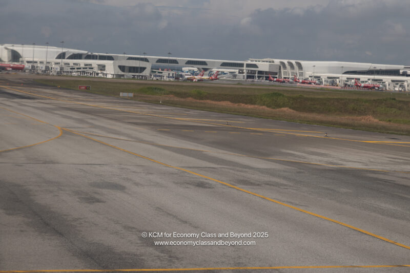a runway with airplanes on it