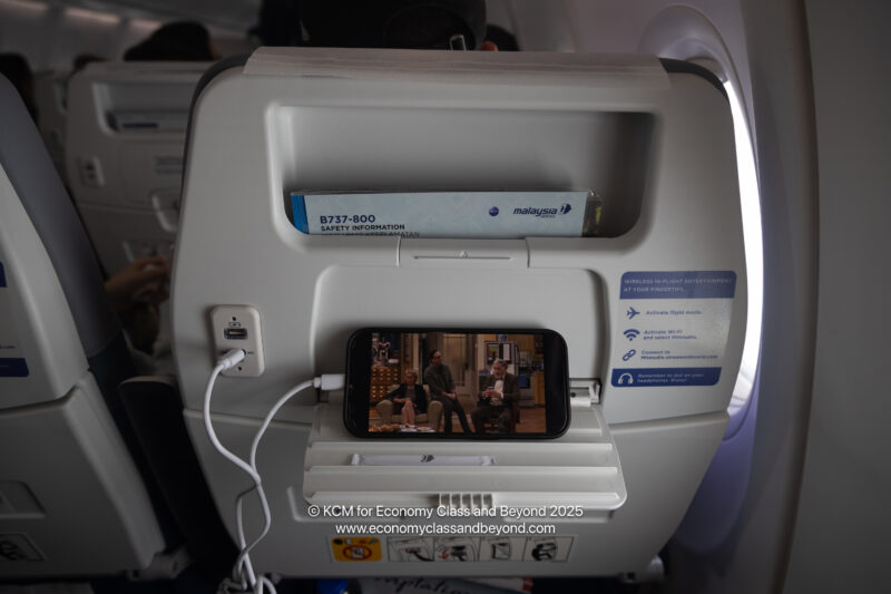 a cell phone on a shelf