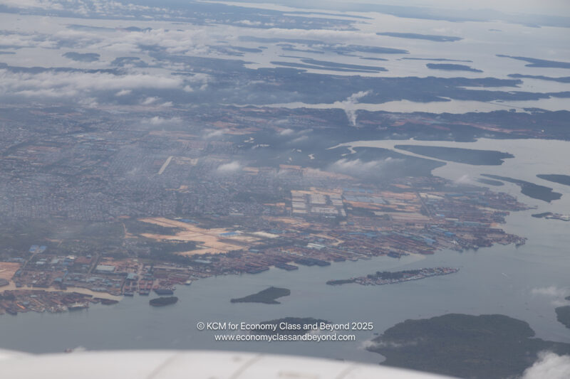 an aerial view of a city and water
