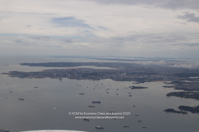 a aerial view of a city and water