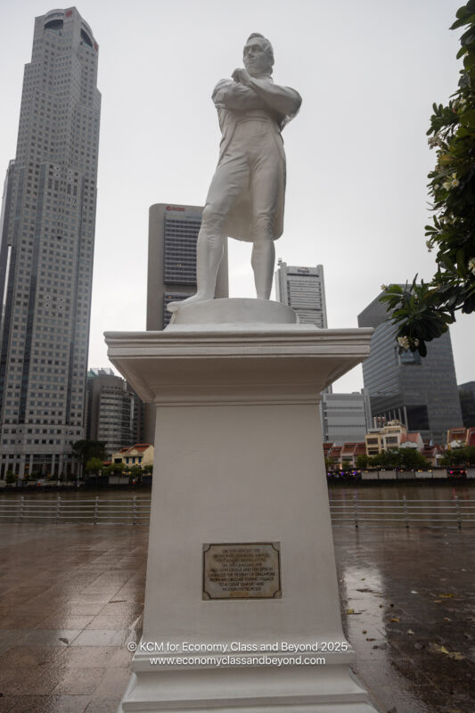 a statue of a man in a city