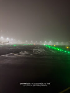 a runway with lights on it at night