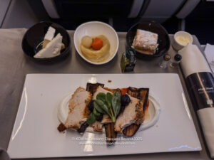 a plate of food on a tray