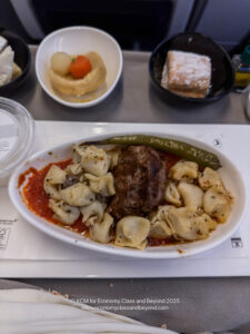 a plate of food on a tray
