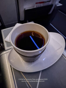 a cup of coffee on a plate