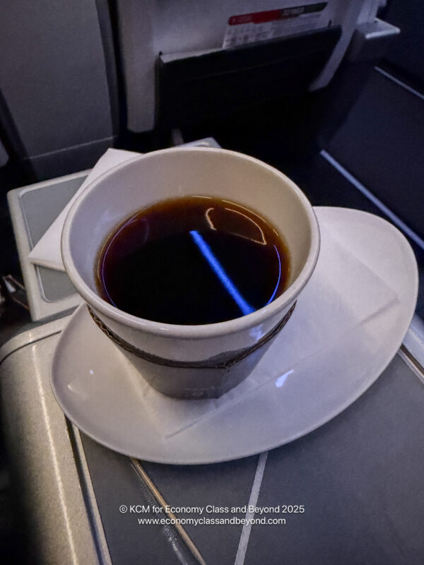 a cup of coffee on a plate