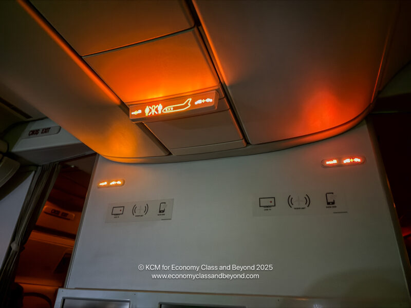 an airplane with an illuminated sign