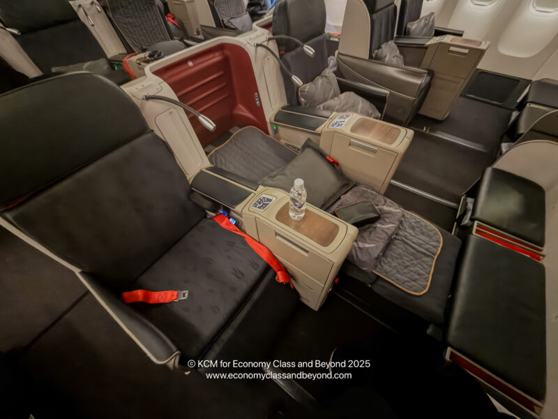 a seat with a bottle of water on it