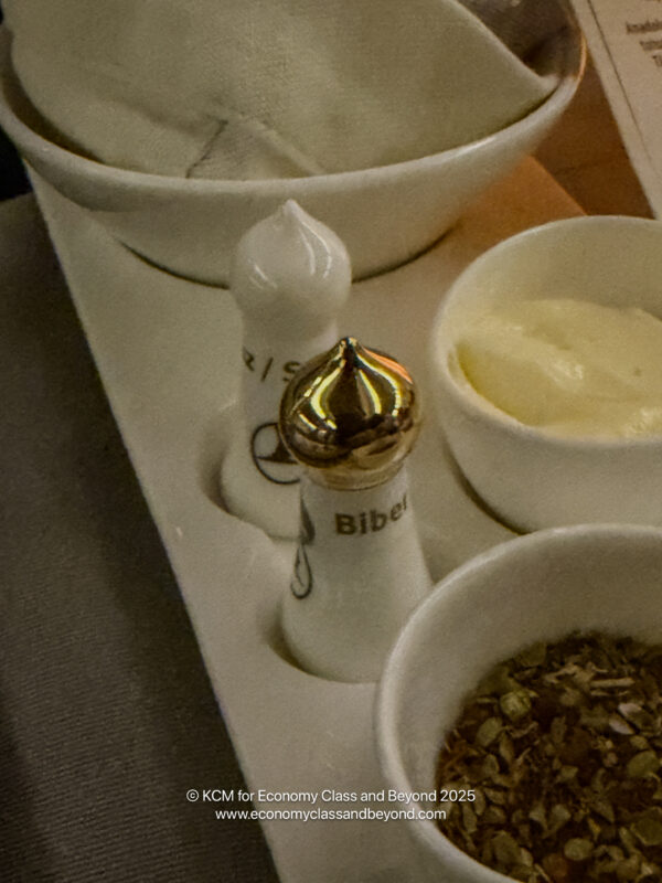 a salt and pepper shaker on a tray