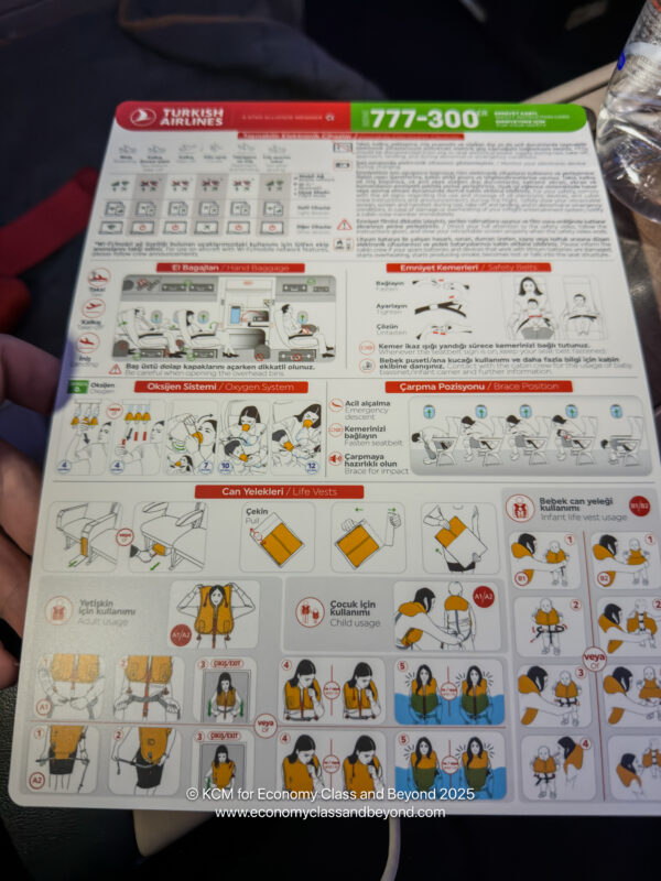 a hand holding a instruction card