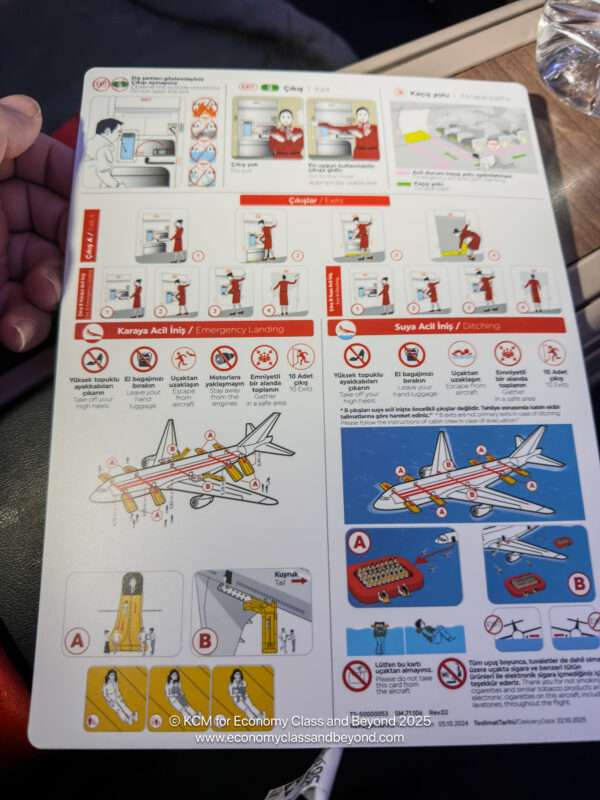 a hand holding a sign