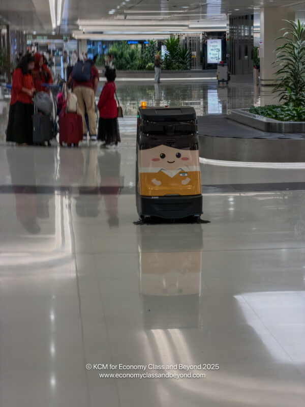 a group of people in a large airport