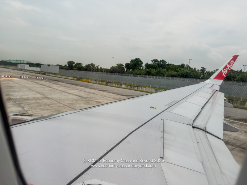an airplane wing on a runway