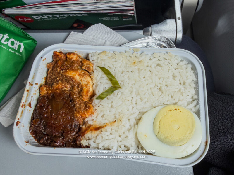 a tray of food on a plane