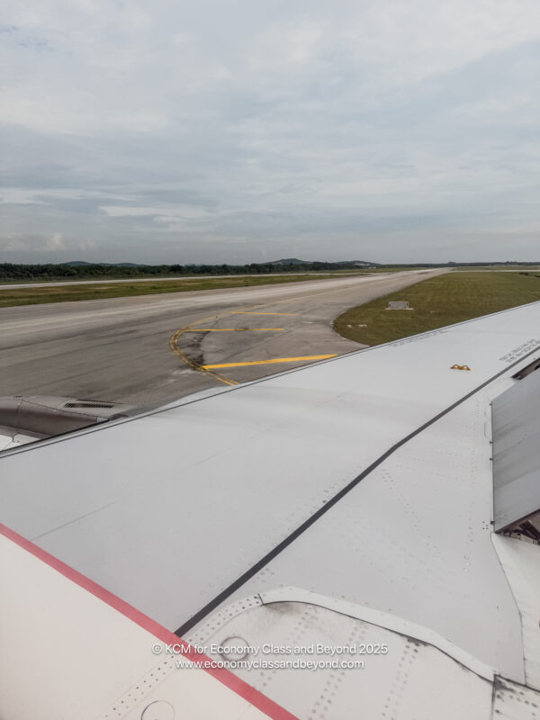 an airplane wing on a runway