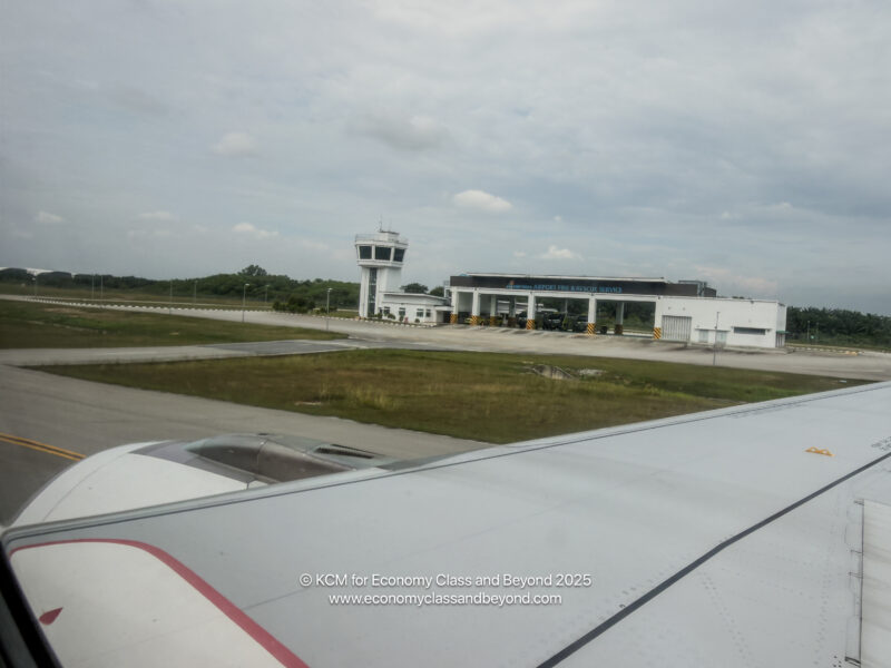 an airplane wing and a building