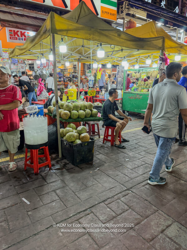people walking in a market