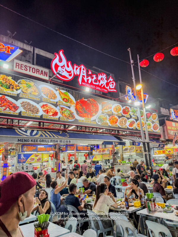 a group of people eating at a restaurant
