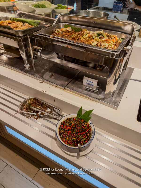 a buffet with food in containers