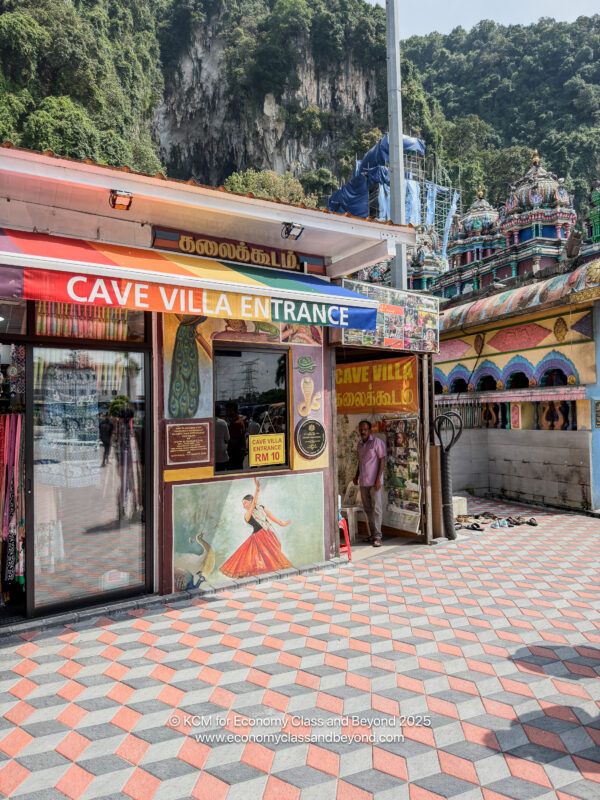a store front with a man walking in front of it