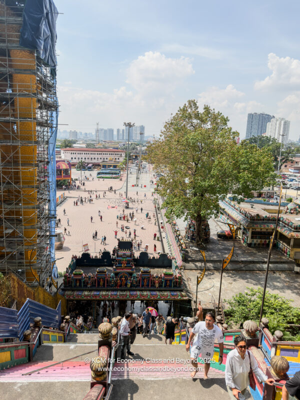 a group of people walking down a staircase