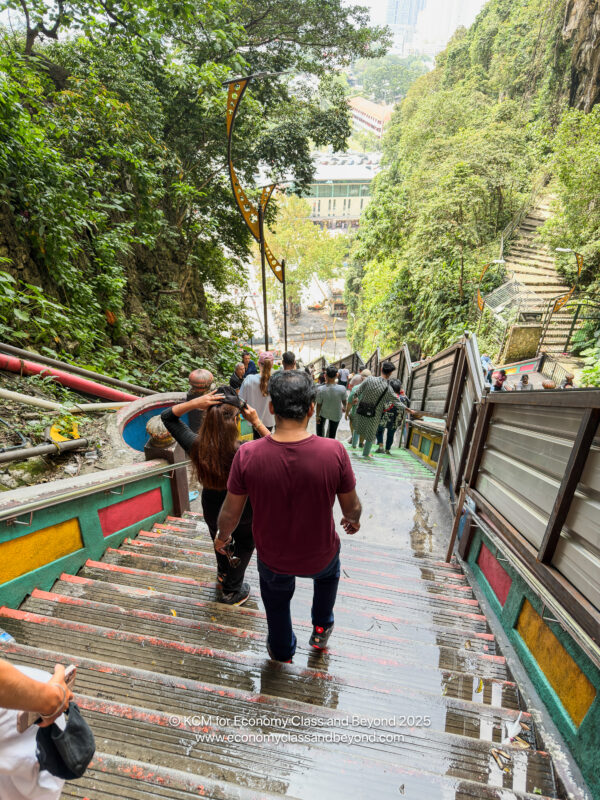 a group of people walking up stairs