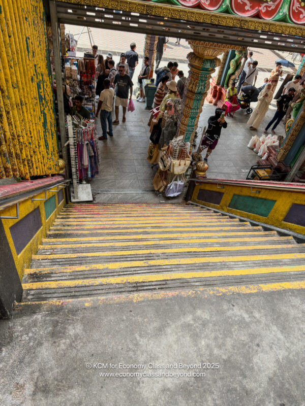 a group of people walking down a staircase