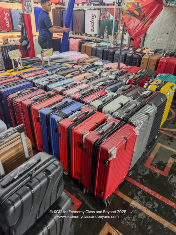a group of luggage in a store