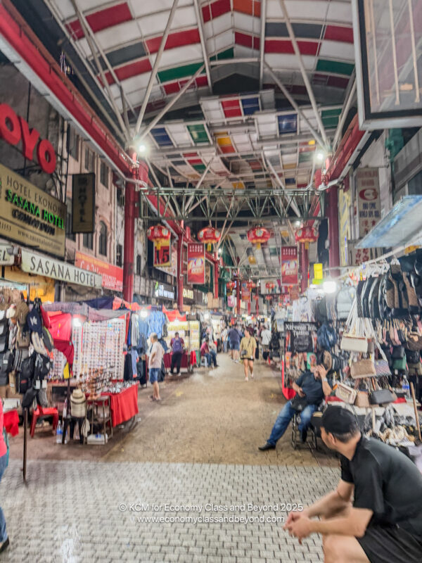 a street with people and signs