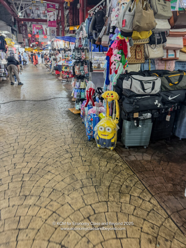 a street with bags and luggage