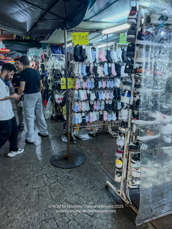 a group of men in a market