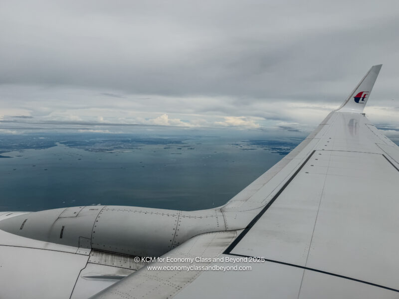 an airplane wing over water