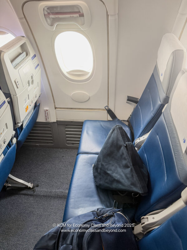 a bag on a seat in an airplane