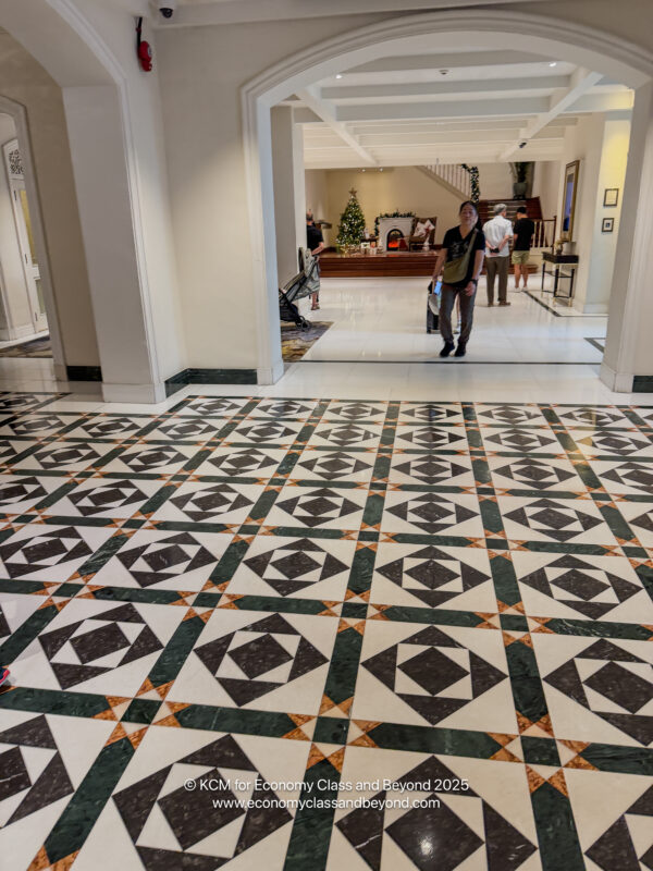 a man walking in a large hall