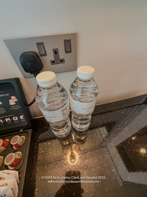 two plastic bottles on a counter
