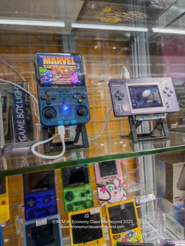 a display case with video game consoles