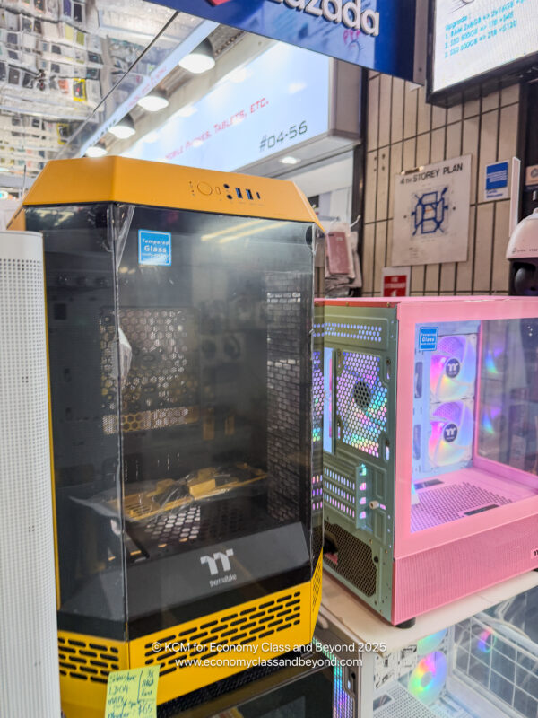 a group of computer cases in a store