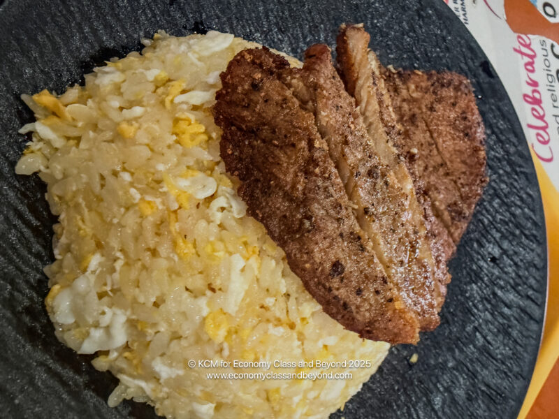 a plate of rice and meat